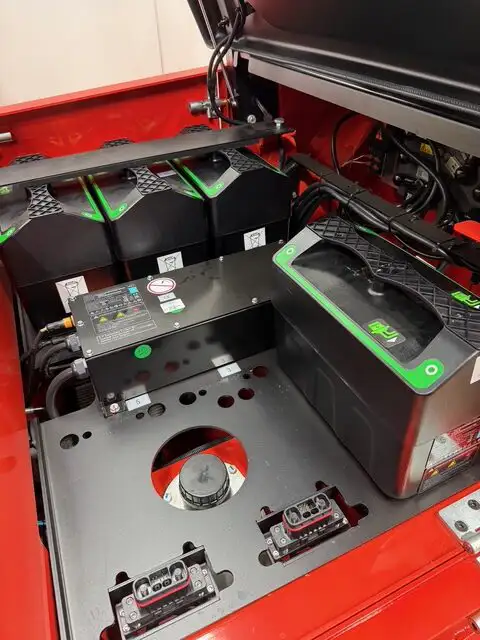 Close up of Forklift batteries partially removed
