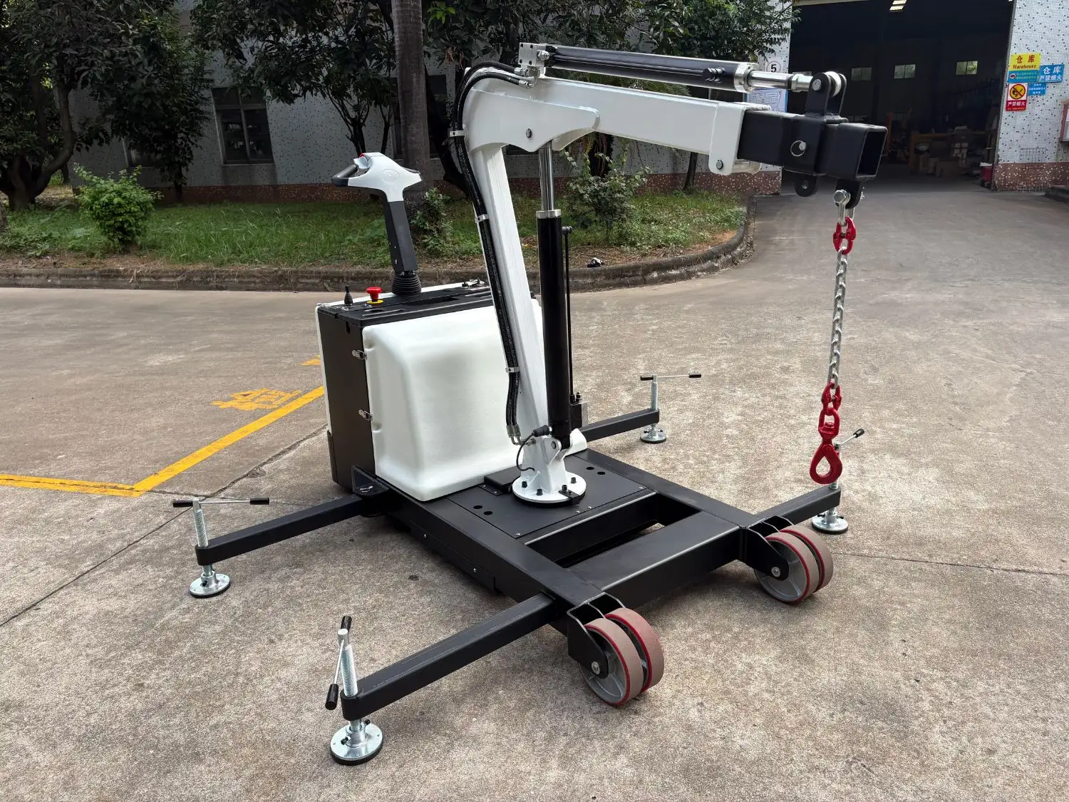 900kg white counterbalanced electric crane outside